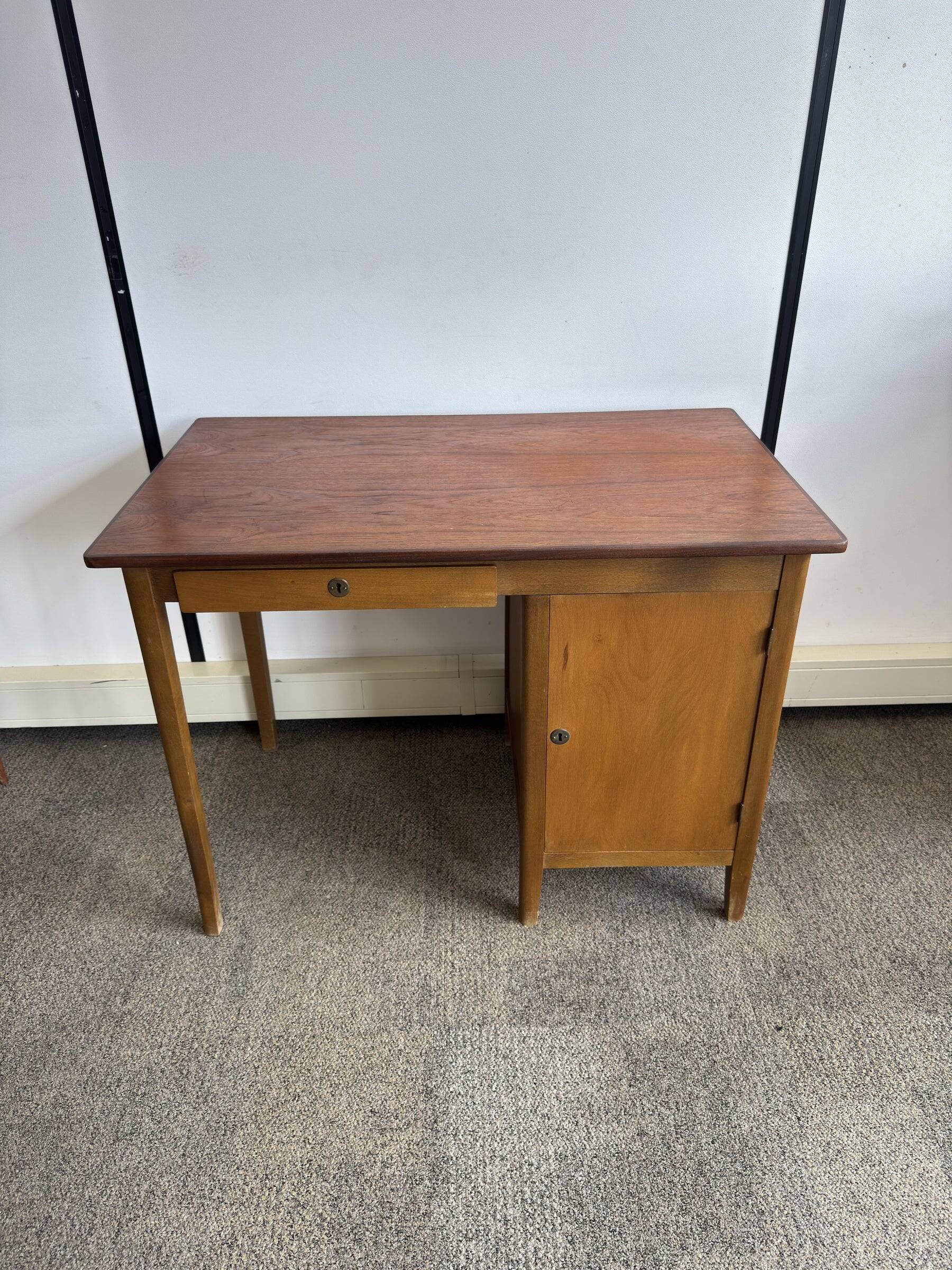 Vintage Danish desk from the 1960s with a drawer and cupboard.