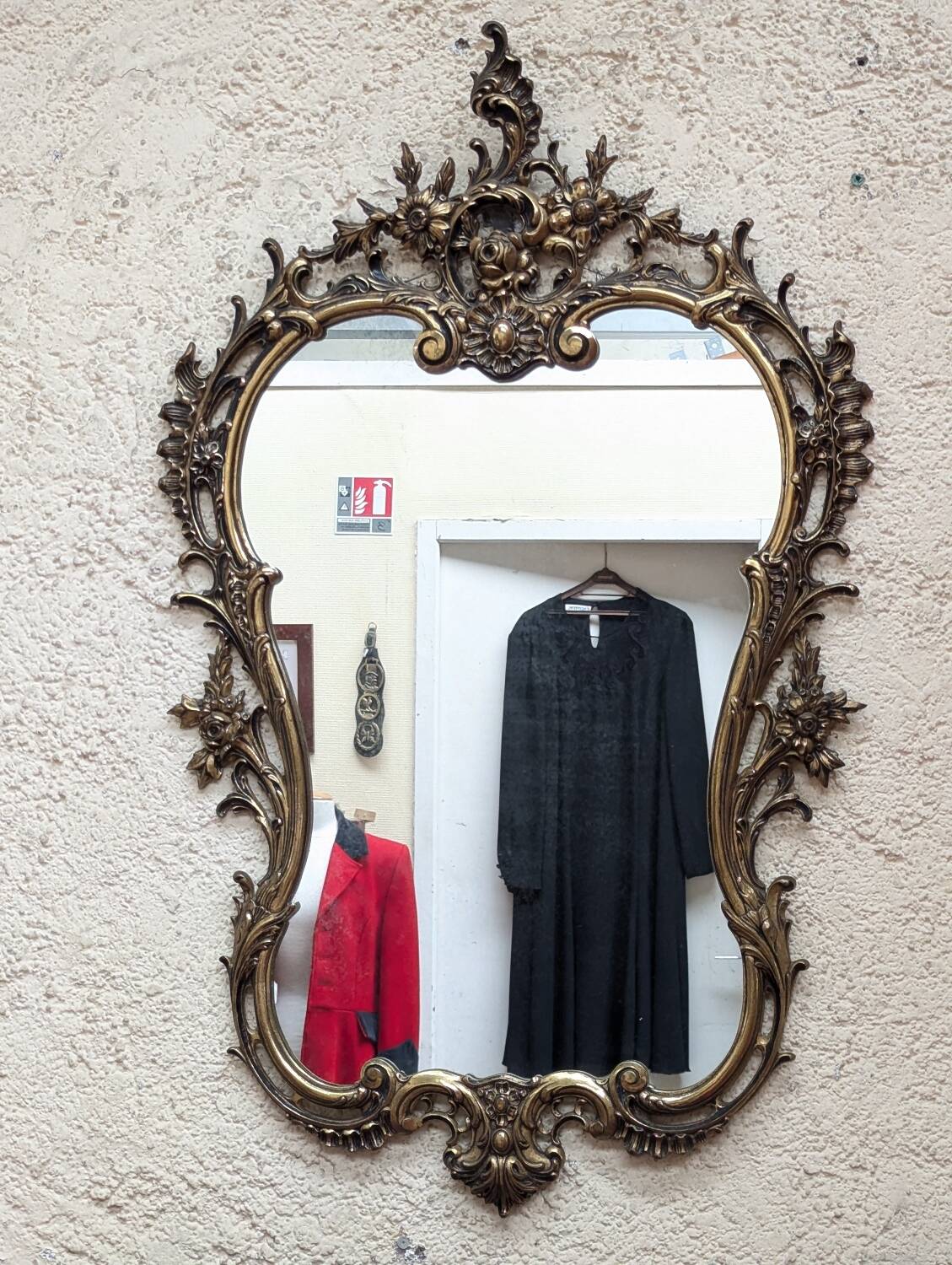 Gold metal wall mirror