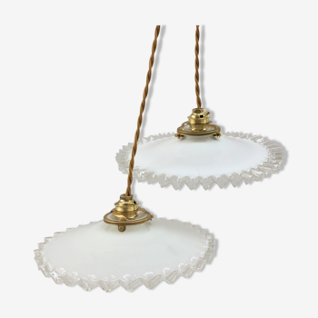 Pair of white opaline suspensions with serrated edges