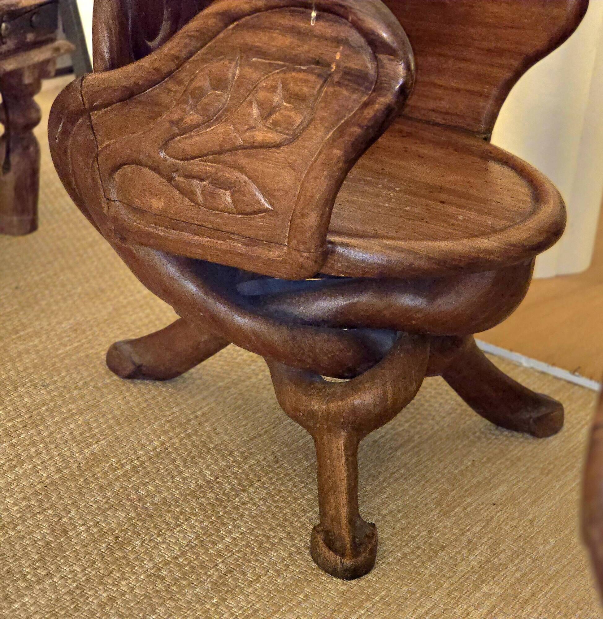 Solid wood chairs inspired by organic shapes sculpted by Gaudi.