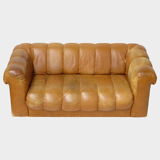 Mid century 2.5 seater sofa in thick cognac buffalo leather, 1970s.