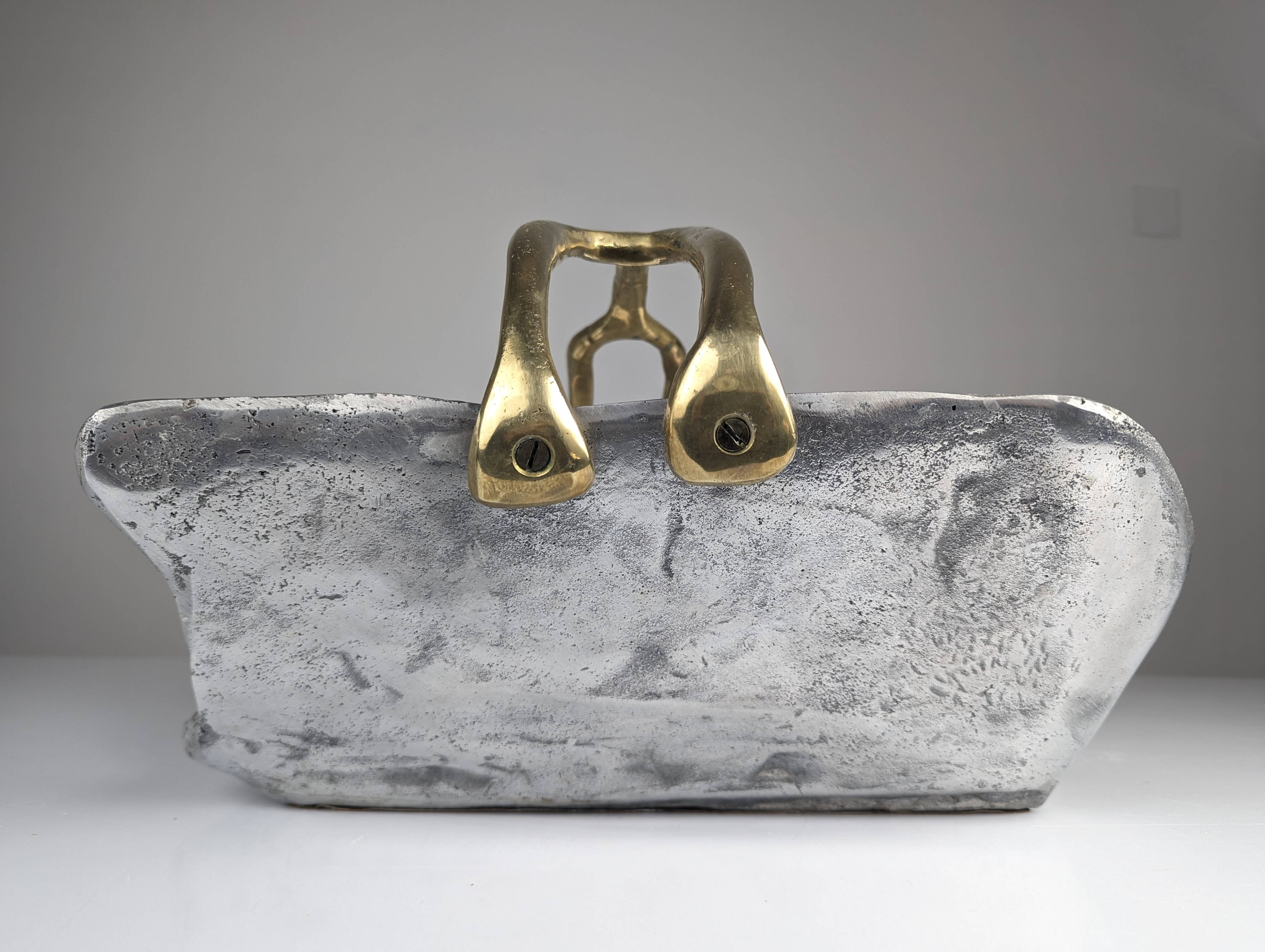 Firewood holder by David Marshall, 1980s