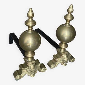 Pair of brass and cast iron firedogs, marmousets decor, louis xiv style