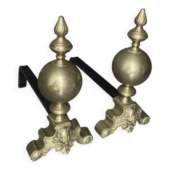 Pair of brass and cast iron firedogs, marmousets decor, louis xiv style