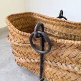 Magazine rack or log rack in straw with brutalist base from the 50s
