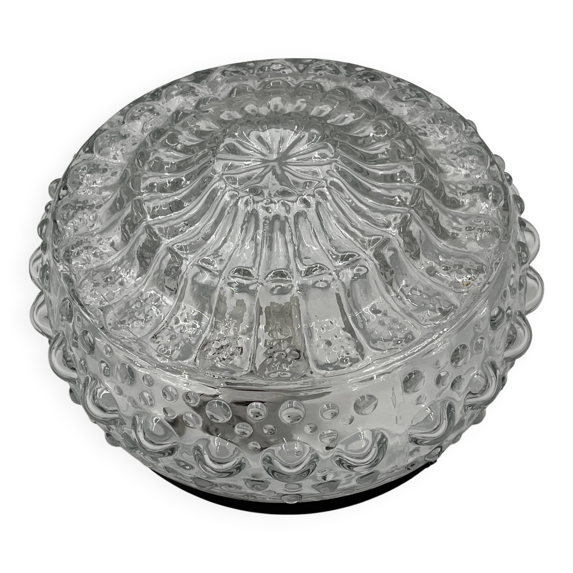 Molded glass ceiling light with spinning top relief