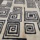 Moroccan Berber rug in cream and black 300x200 cm – spiral geometric pattern
