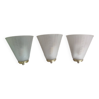 Art Deco trio of wall lights with frosted glass and brass.