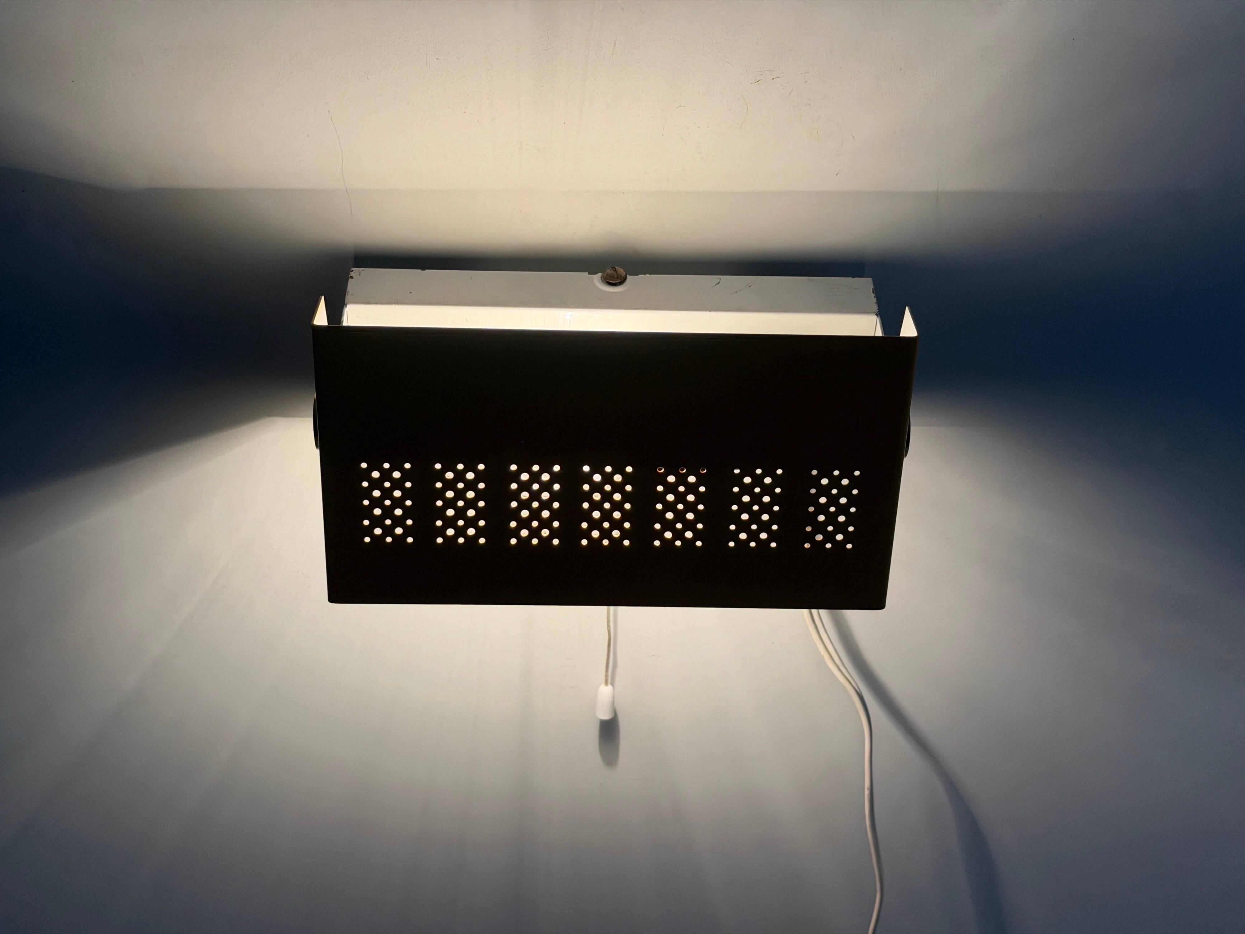 Pair of yellow metal wall lights from the mid-century by N Leuchten, 1960s, Germany.