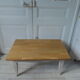Vintage coffee table patinated pearl gray waxed finish, top against glued varnished oak