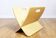 Curved plywood magazine rack, 1980