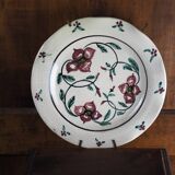 Meyssac plate decorated with flowers on cracked background early twentieth century and its support