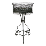 Wrought iron planter on stand