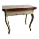 Rustic red and cream wooden dining table, moulded top, 1950s.