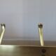 Large wall-mounted coat rack in gold aluminum, 60s-70s
