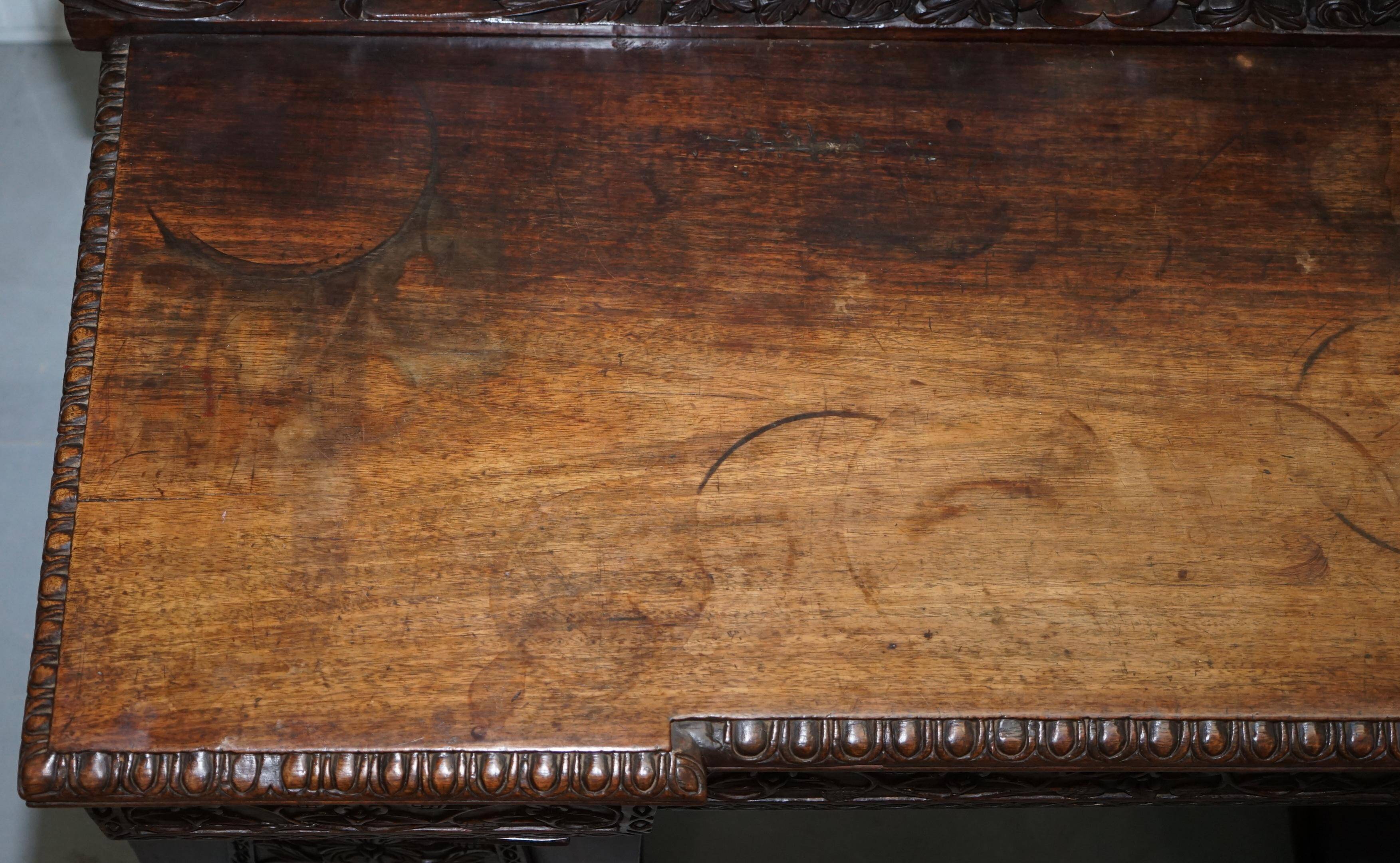 19th-century hand-carved Anglo-Burmese buffet with drawers and cupboards.