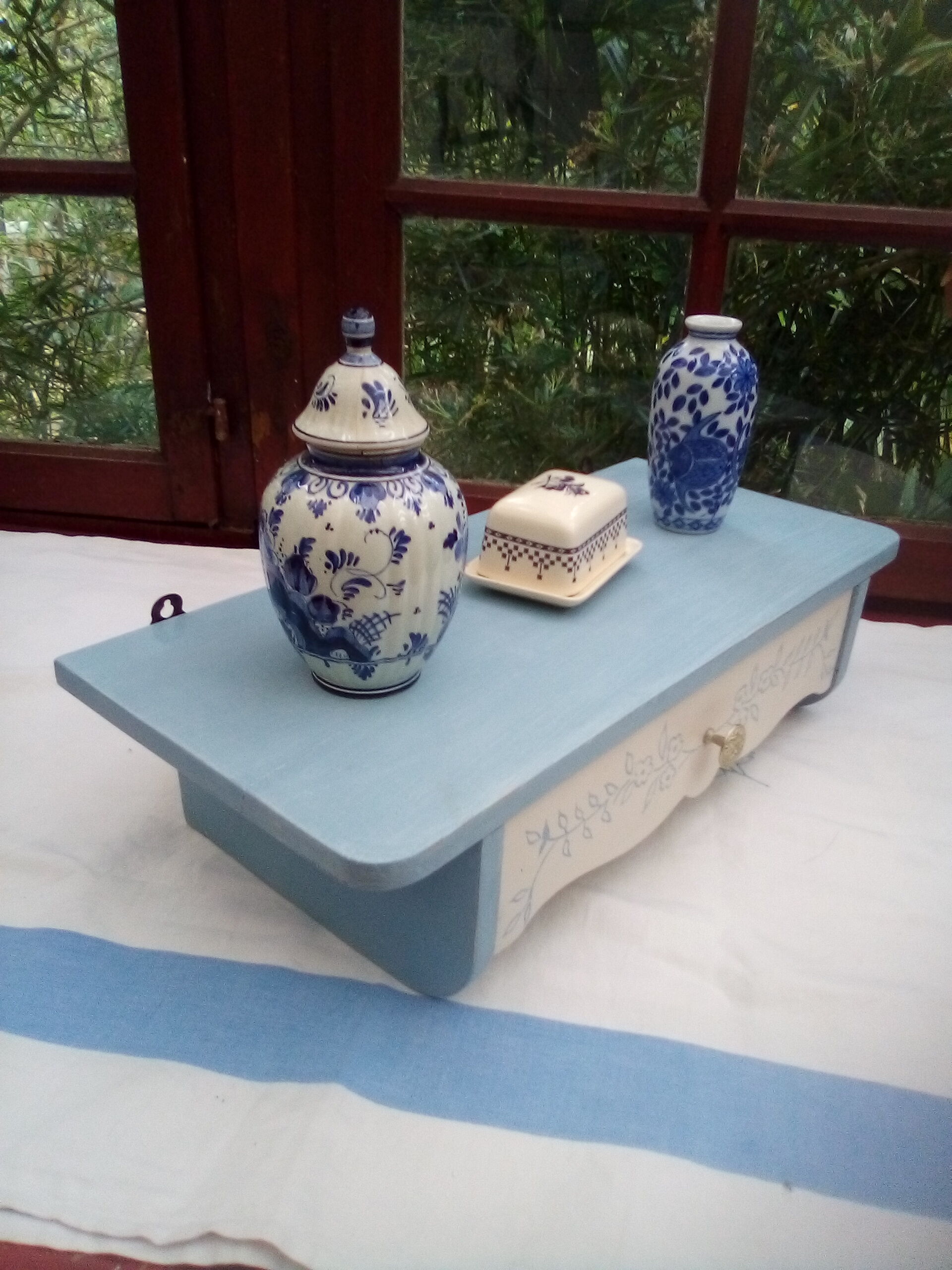 Old wooden shelf with drawer