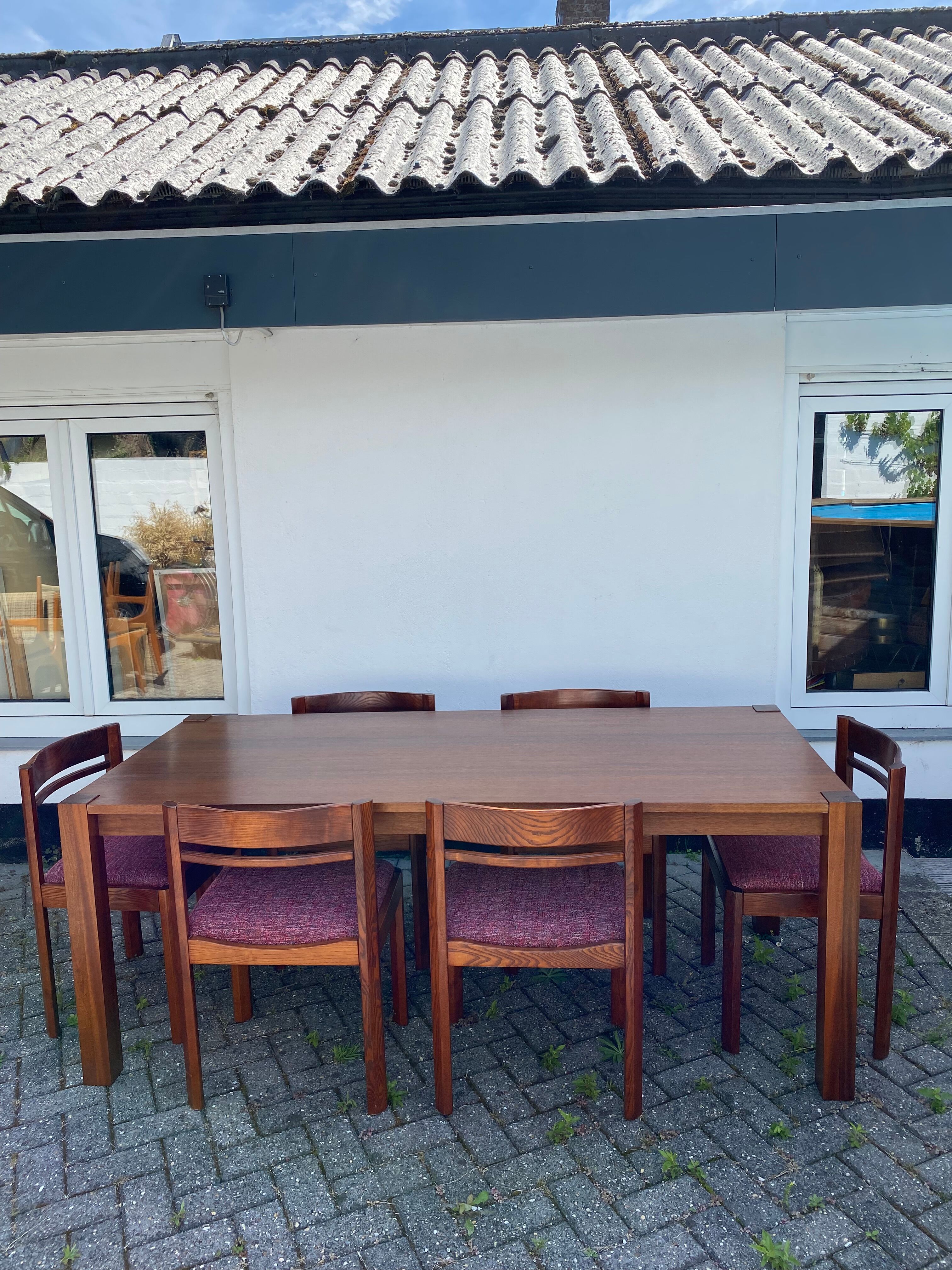 Teak wood dining table with 6 vintage rosewood chairs