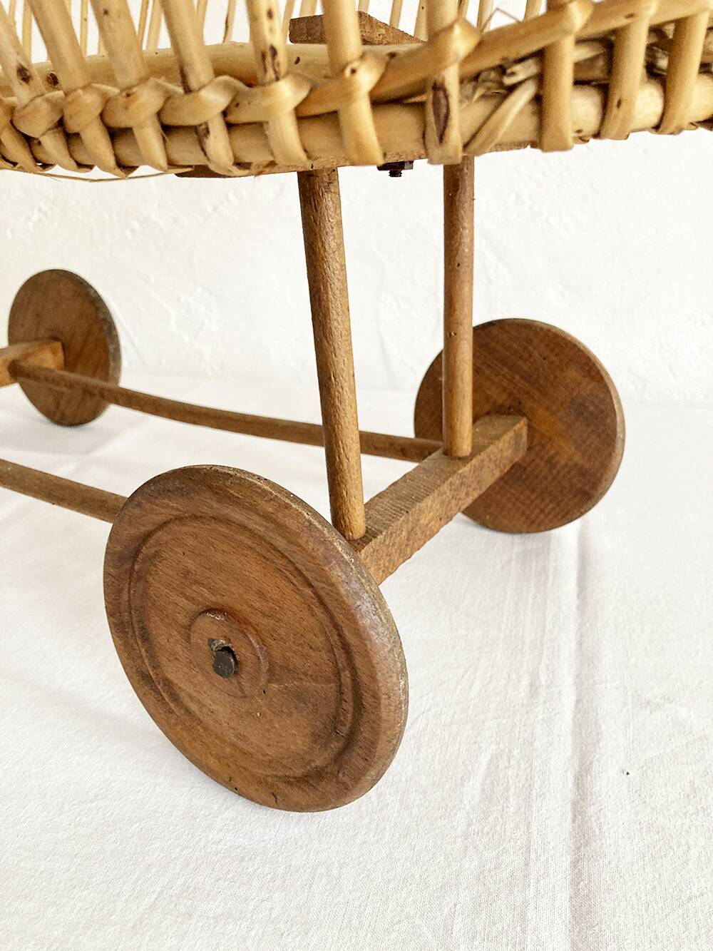 Old rattan doll's pram