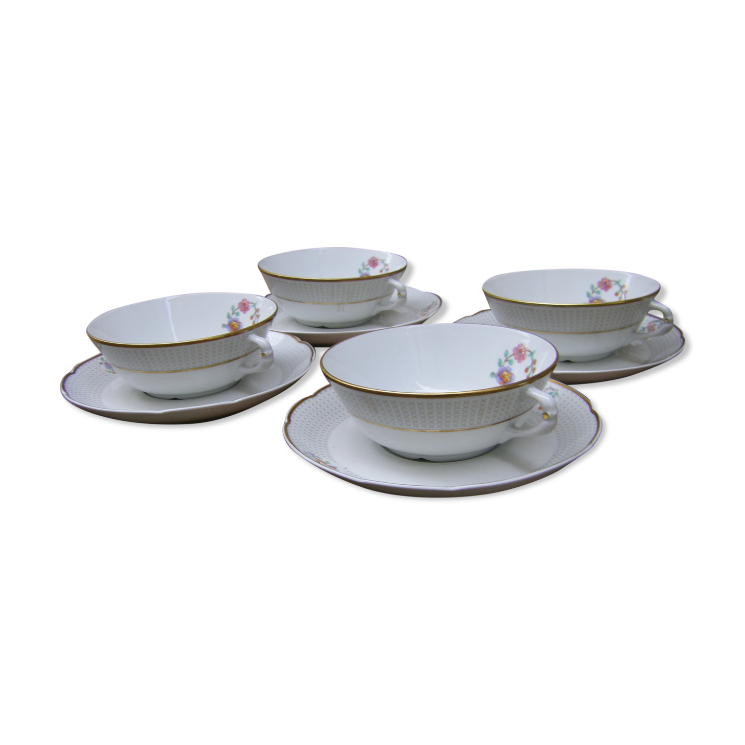 Four porcelain tea cups