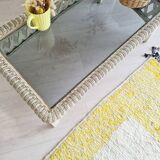 White rattan coffee table with glass top