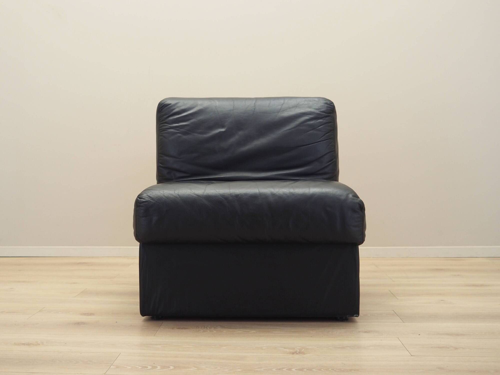 Black leather pouf/armchair, Italian design, 1960s, made in Italy.
