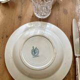 Set of eight Moulin des loups soup plates