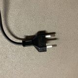 Black metal tripod floor lamp