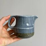 Blue and beige ceramic milk jug