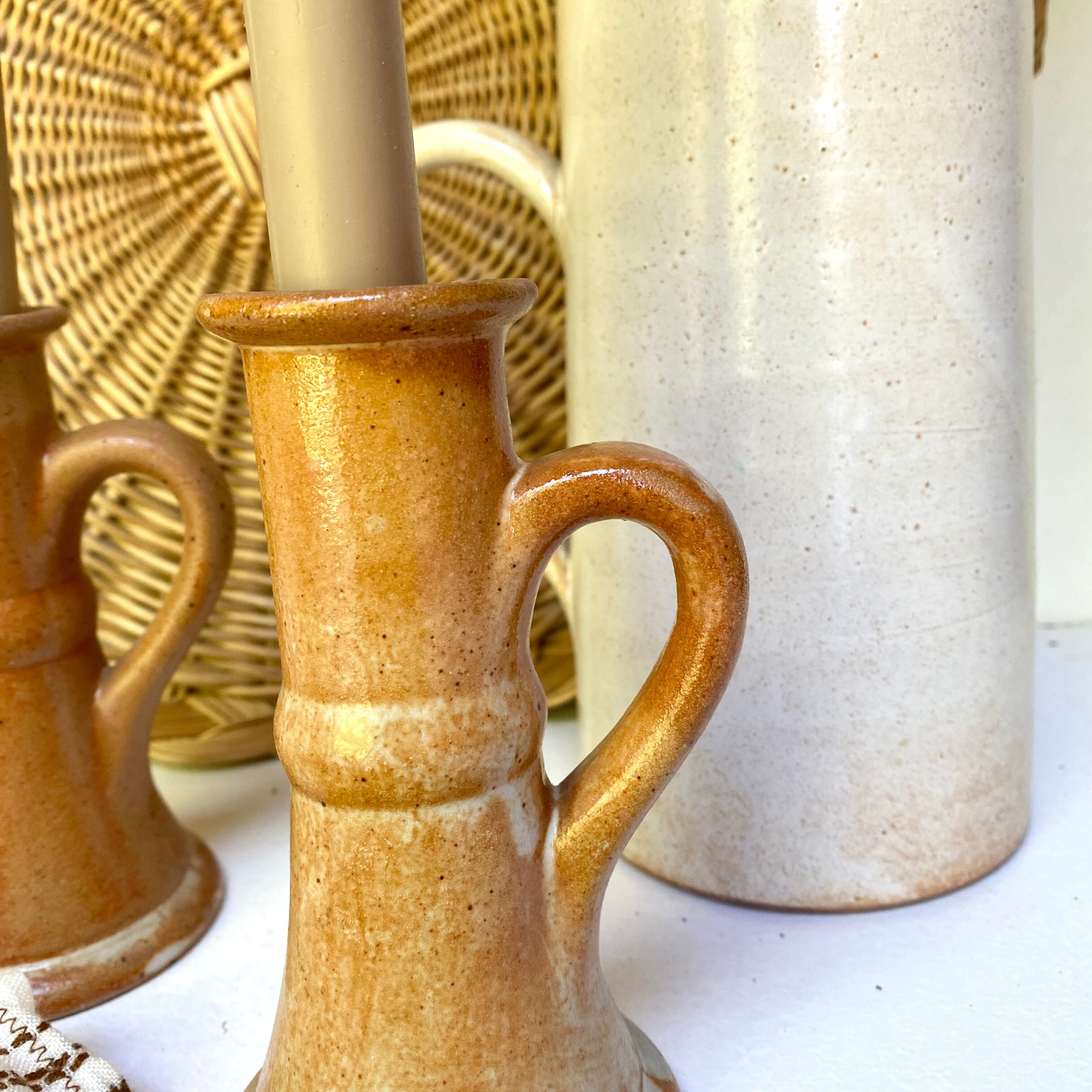 Pair of bohemian sandstone candle holders