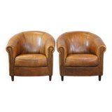 Set of 2 sheep leather club chairs in a cognac color