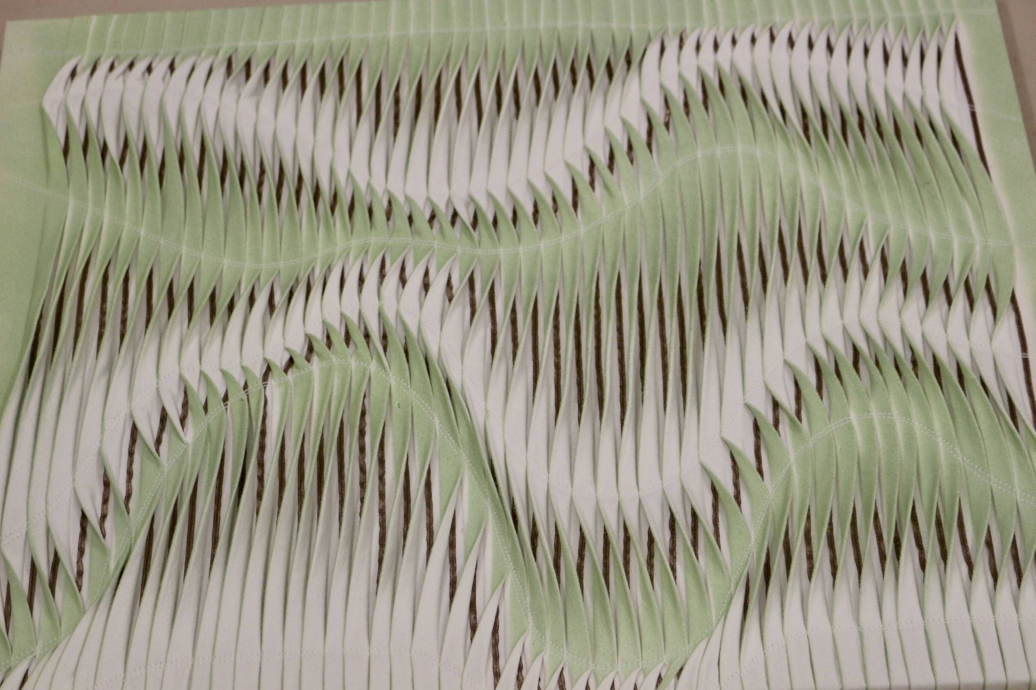 Textured wave effect painting by pleating in light green color. Contemporary. Ref Riviera