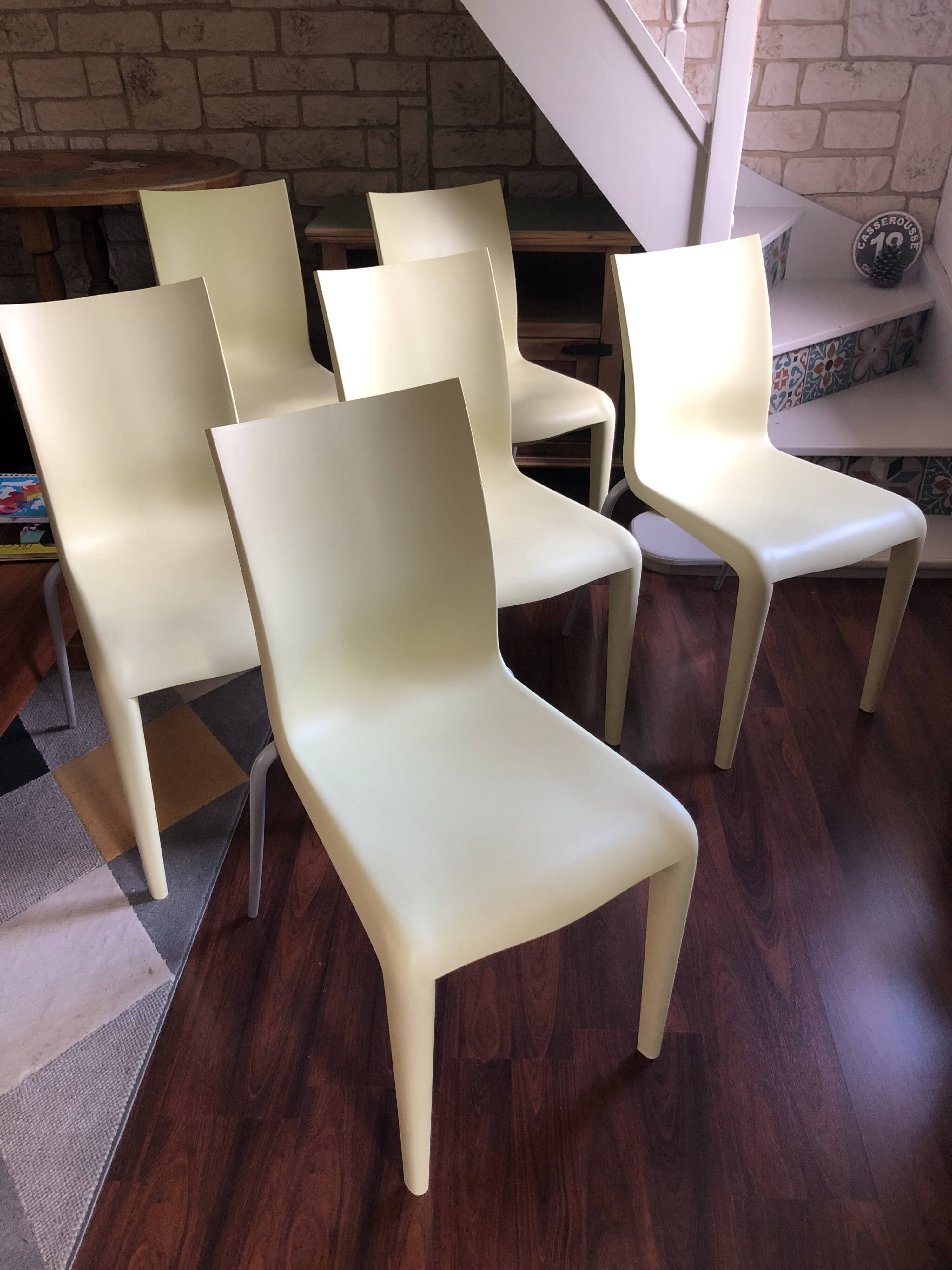Set of 6 pale yellow vintage chairs by designer Philippe Starck.