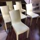 Set of 6 pale yellow vintage chairs by designer Philippe Starck.