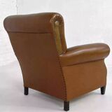 Pair of 1950s club armchairs in imitation leather and wood