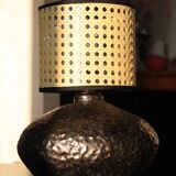 Stoneware lamp with cane shade