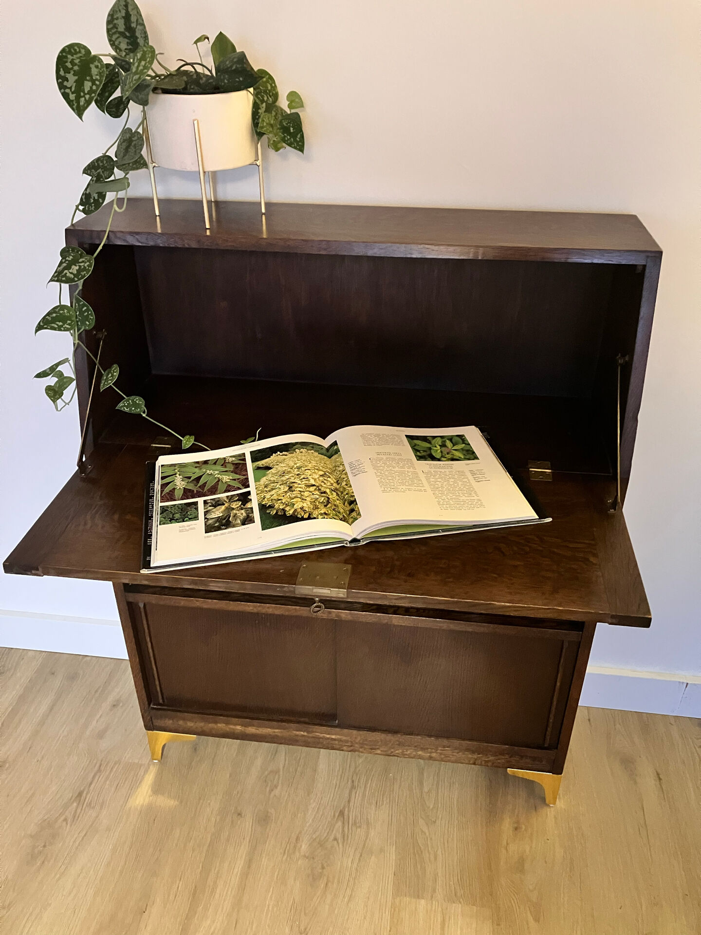 Solid oak secretary with golden feet