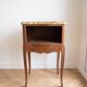Pair of Louis XV bedside tables with marble and marquetry.