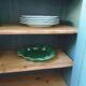 Vintage Parisian sideboard with 2 doors and 2 drawers, re-enchanted in smoky green.