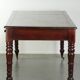 Antique English writing desk from the late 19th century with a warm colour
