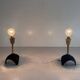 Pair of mid-century bedside lamps in brass and black metal, 1960, Italy.