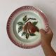 Antique shallow dish in slipware with pear decoration.