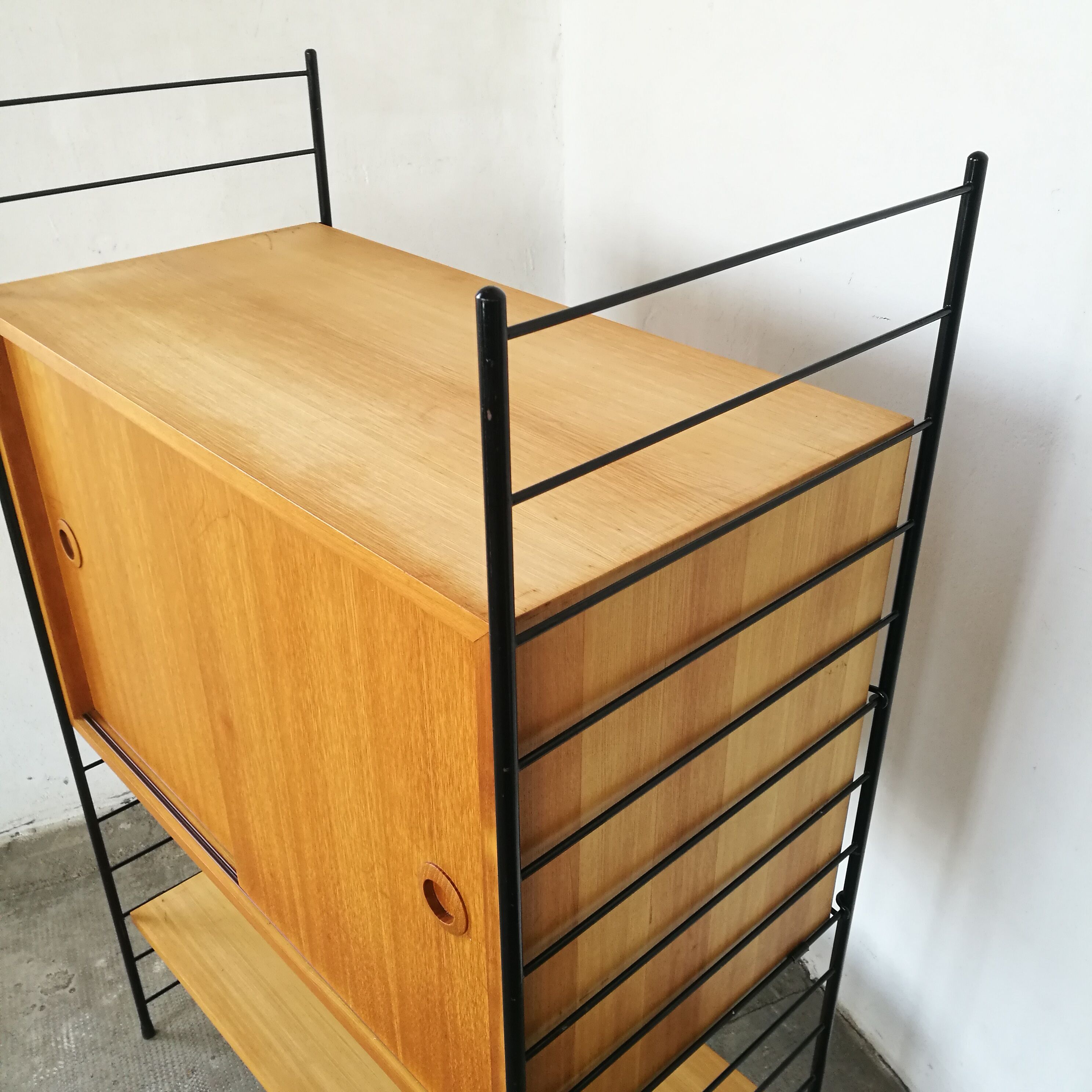 Scandinavian modular shelf with string scale