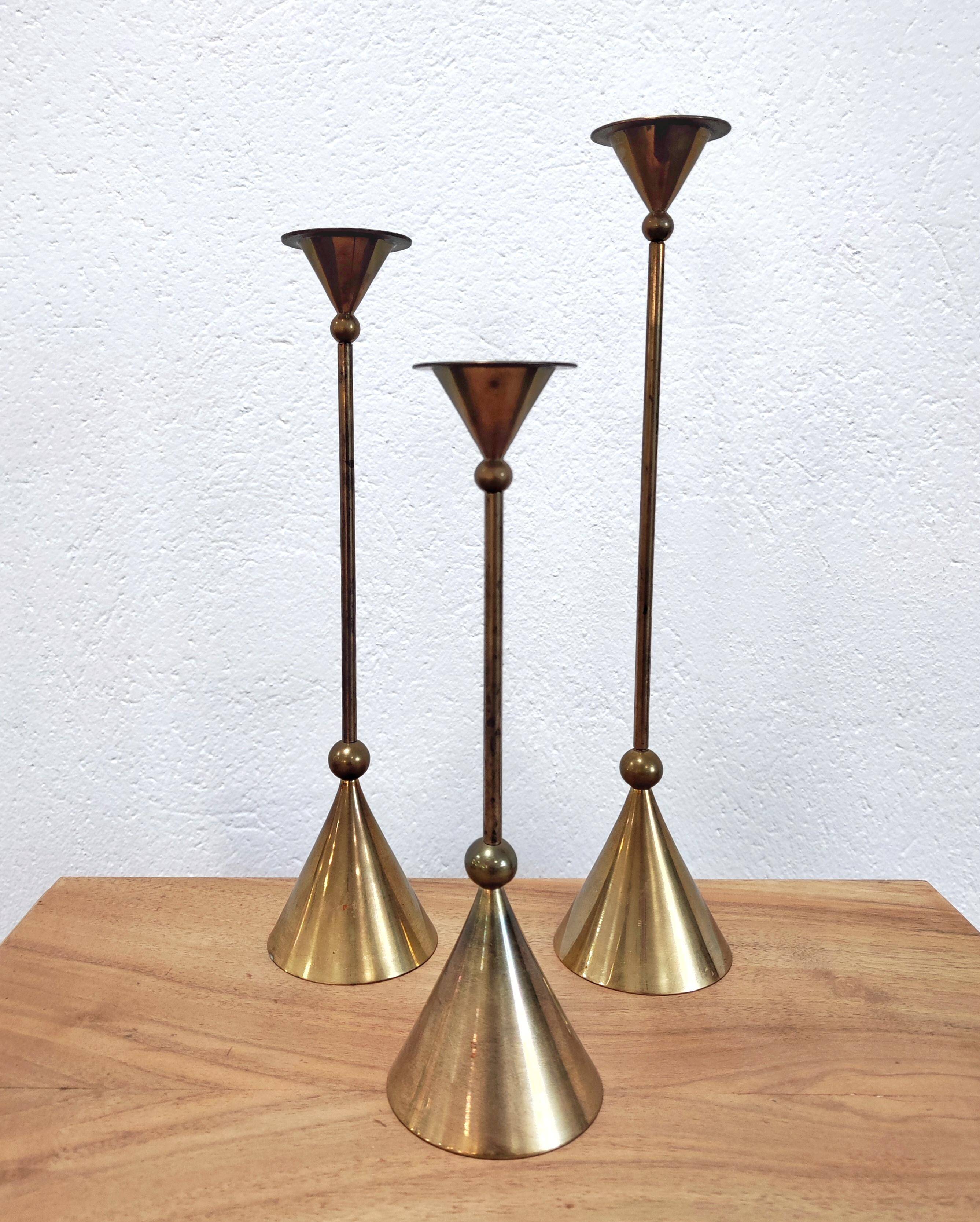 Set of three bronze candlesticks by Christian de Beaumont from the 1980s.