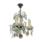 Three-light chandelier in bronze and cut crystal, early 20th century work.