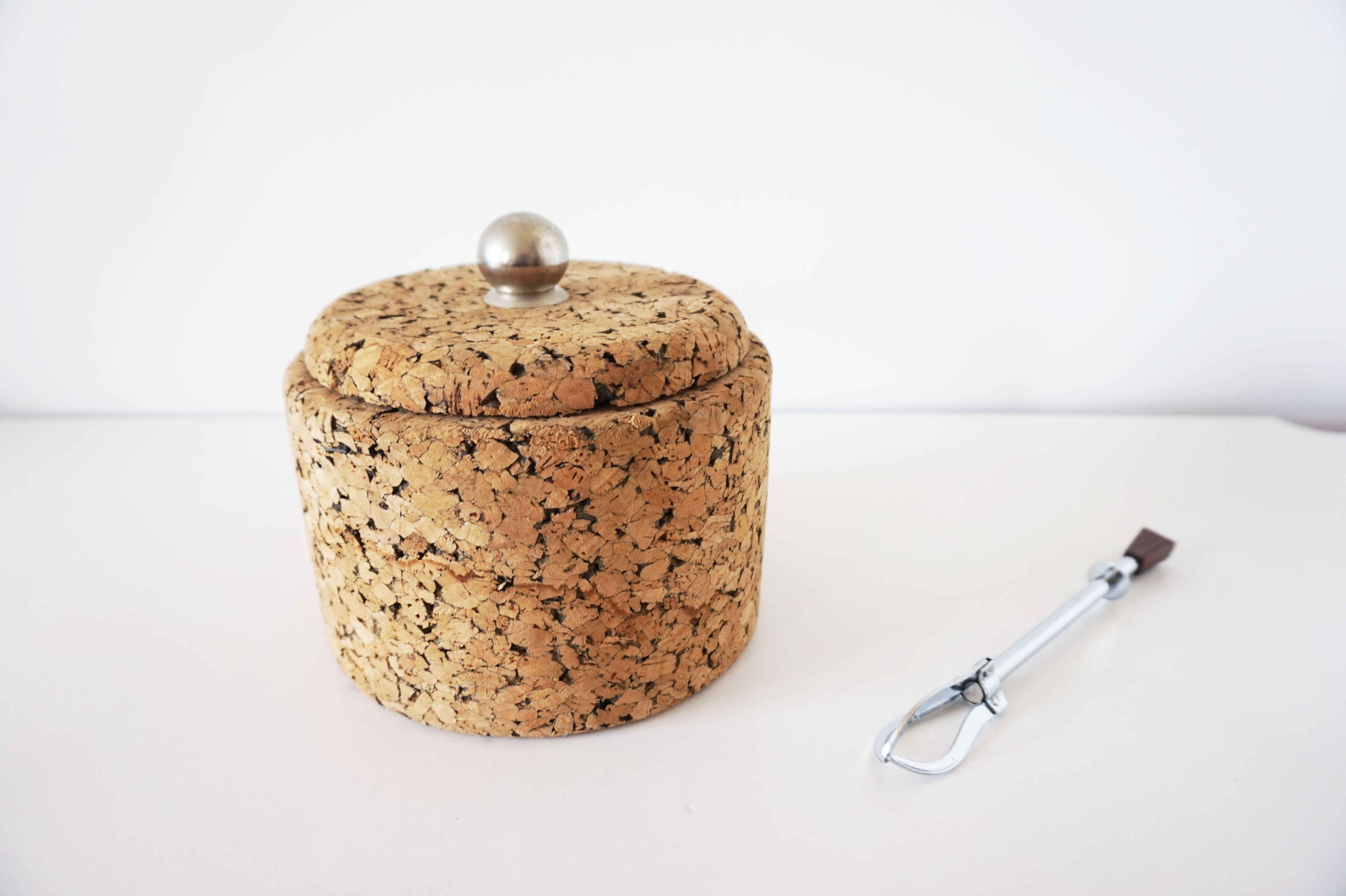Cork ice bucket and its 1970 ice clip