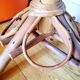 Old bamboo/rattan table with woven palm leaves.