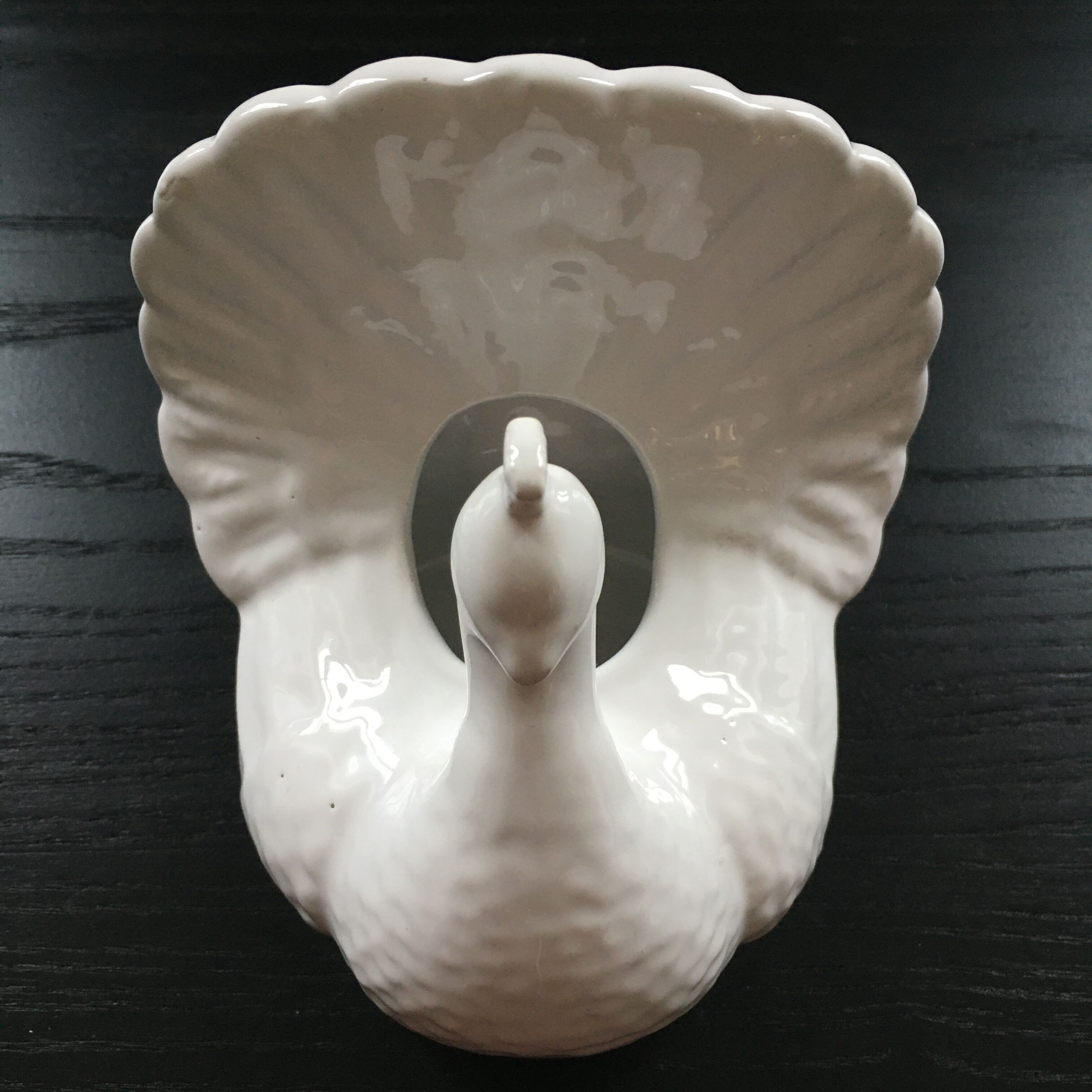 White peacock vase
