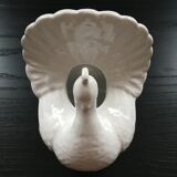 White peacock vase