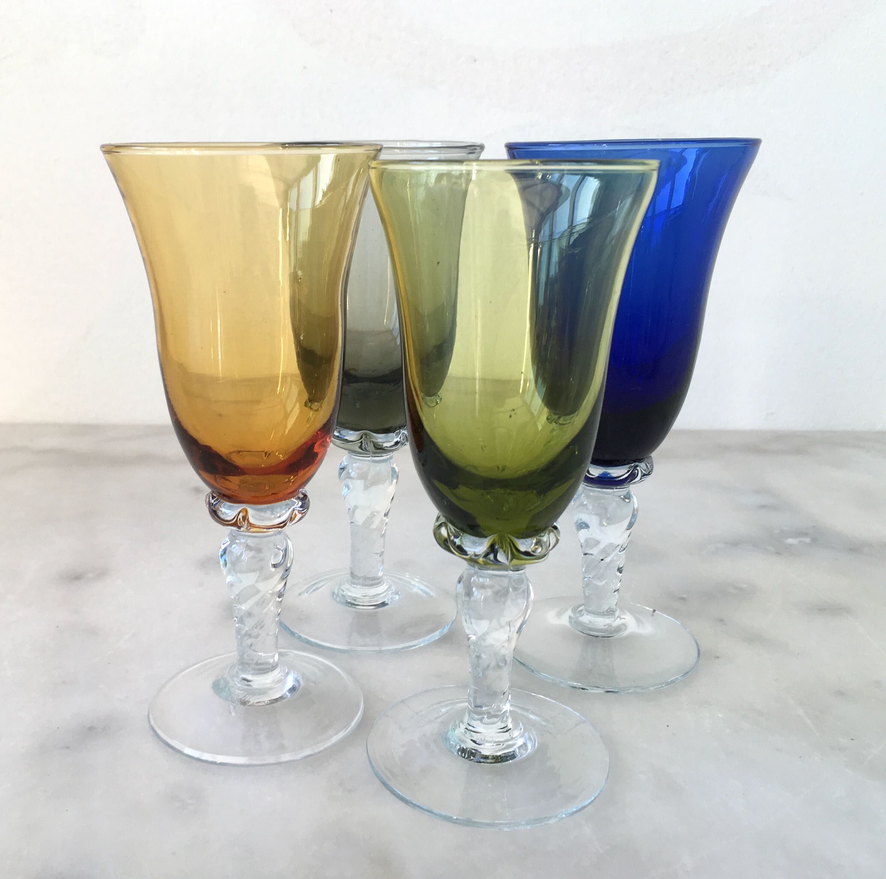 Set of four colored blown glasses